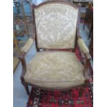 A 19th century carved walnut upholstered open armchair, 108cm tall x 75cm wide x 70cm deep, some