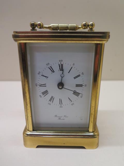 A Bernard Freres brass carriage clock, 11cm tall, in good condition, running with a key
