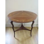 An Edwardian inlaid mahogany dropleaf side table on shaped legs united by an undertier, some wear