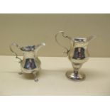 Two Georgian silver cream jugs, generally good, some small dents, tallest 12cm, total silver