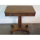 A 19th century rosewood centre table with one active and three dummy drawers on a turned column