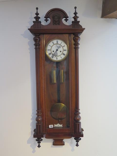 A 19th century double weight wall clock by Gustav Becker with two piece dial, 115cm tall, in running