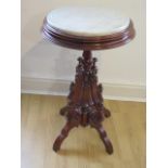 A Victorian marble top mahogany Jardinière stand 76 cm tall 45 cm diameter in good condition