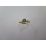 A hallmarked 18ct yellow gold diamond solitaire ring, approx 0.40ct, size N, approx 2.3 grams,