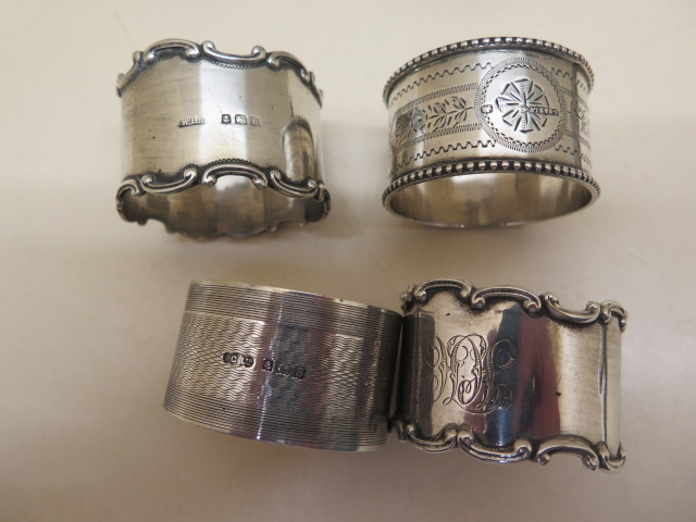 A pair of silver salts, four silver napkin rings and an Eastern white metal embossed mirror, - Image 4 of 6