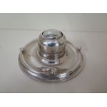 A silver capstan inkwell, Birmingham 1913/14 JG & S, with glass inkwell, 16cm diameter, approx 10.