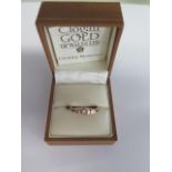 A hallmarked 9ct yellow gold Clogan ring, size O, approx 3.2 grams, in good condition with box