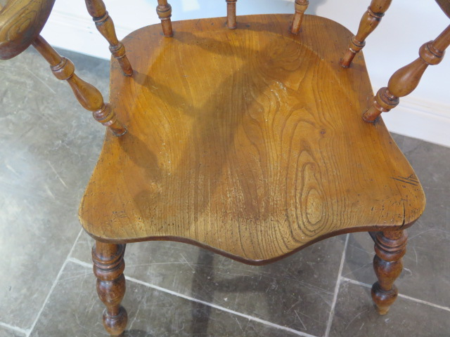 A 19th century ash and elm smokers bow armchair with a well shaped seat, 81cm tall x 67cm wide, seat - Image 2 of 3