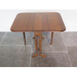 A Victorian walnut drop leaf Sutherland side table, 54cm tall x 55cm x 71cm, in generally good