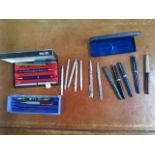 A collection of 18 assorted fountain ballpoint pens and pencils including Swan Mabie Todd, Parker