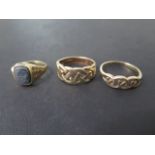 Three hallmarked 9ct yellow gold rings, sizes TR/N, approx 9.8 grams, generally good some usage