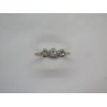 An 18ct yellow gold and platinum three stone diamond ring, size O, marked 18ct Plat, approx 2.3