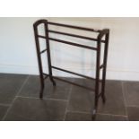 An Edwardian mahogany towel rail, 86cm tall x 66cm