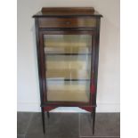 An Edwardian mahogany display cabinet, 132cm tall x 61cm x 34cm in generally good condition