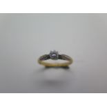 An 18ct yellow gold diamond solitaire ring, approx 0.20ct, ring size P, approx 2.5 grams, visible