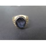 A hallmarked 9ct yellow gold Intaglio ring, size W, approx 5 grams, in generally good condition