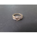 A 9ct yellow gold and diamond ring, marked 375, size K, approx 1.9 grams, some wear to shank but