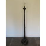 A chinoserie decorated black lacquer standard lamp, 153cm tall, will need re-wiring