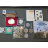 A collection of British coinage including a silver, 2.8 troy, 25 year coronation medal