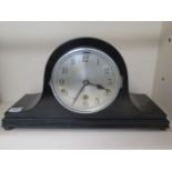 An ebonised Westminster chiming mantel clock in working restored condition, 42cm wide