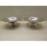 A pair of Walker and Hall silver footed dishes, Sheffield 1904/05, 6.5cm tall x 17cm wide, total