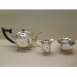 A silver three piece tea set with associated bowl, tea pot and jug, Birmingham 1906/07, bowl