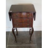 A walnut three drawer dropleaf sewing table, 75cm tall x 31cm x 70cm extended