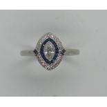 A platinum sapphire and marquis cut diamond ring, size approx N 1/2, head approx 12mm x 10mm, n good