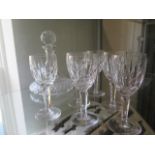 A Waterford cut glass ships decanter 25cm tall and 6 Waterford wine glasses, 16cm tall, all in