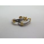 A pair of half hoop 18ct hallmarked white and gold diamond ear rings