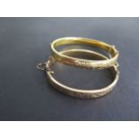 Two 9ct gold plated and metal filled bangles, 6.5cm and 6cm by 6cm and 5.5cm, both generally good