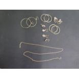 Two pairs of 9ct gold earrings and a 9ct chain, total weight approx 7.7 grams and four pairs of