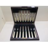 A silver bladed six setting cake knife and fork set, Sheffield 1937/38 RFM, total weight approx 10.5