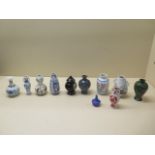 A 20th century collection of eight miniature Japanese porcelain vases, together with three others,