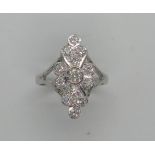 An 18ct white gold Art Deco style diamond cluster ring, size approx O 1/2 set with 13 diamonds, head