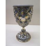 An impressive embossed silver gilt goblet, London 1861, Daniel and Charles Heule, 18cm tall,