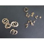 Three pairs of 9ct earrings, all marked 375, approx 4.8 grams and other assorted gilt earrings,