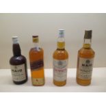 A 25oz bottle of Haig Blended Scotch whisky, a 26 2/3 floz bottle of Dewars White label 70% proof