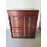 A good Victorian tambour front mahogany microscope slide cabinet with 80 drawers with brass label