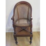 A 19th century childs mahogany chair and table with cane work, 92cm tall, caning good