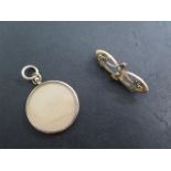 A hallmarked 9ct yellow gold brooch missing pin and a hallmarked 9ct gold pendant mount, total