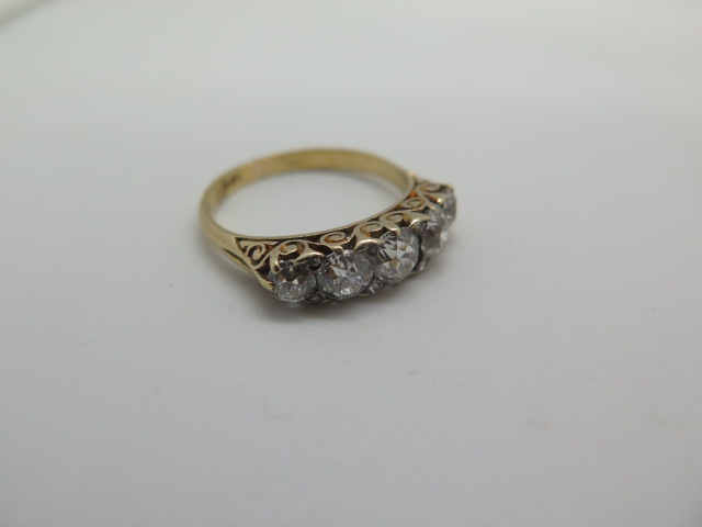 A five stone diamond ring comprising of five old European cut diamonds graduated in size between - Image 2 of 3