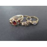 Three hallmarked 9ct dress rings, sizes S and M, approx 7.6 grams, some usage marks but generally