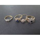 Three hallmarked 9ct yellow gold rings, sizes Q and O, approx 8.4 grams, and an 18ct ring, marked