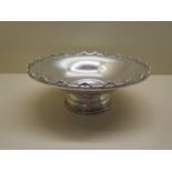 A silver footed bowl by Mappin and Webb, Birmingham 1935/36, 8.5cm tall x 22cm diameter, approx 10.9