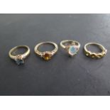 Four hallmarked 9ct yellow gold rings, sizes N and R, total weight approx 11 grams, all good