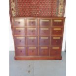 A mahogany apothecary chemist style chest with 16 labelled drawers made by a local craftsman to a