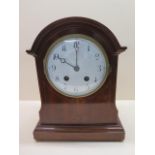 An Edwardian inlaid mahogany mantle clock, 30cm tall, case and dial good, running and strikes
