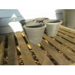 Four small grey frost proof plant pots 30 cm diameter