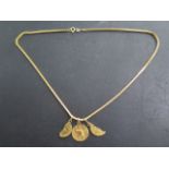 A yellow gold chain marked 21K Italy, 50cm long, with two hallmarked 18ct coin type pendants and a